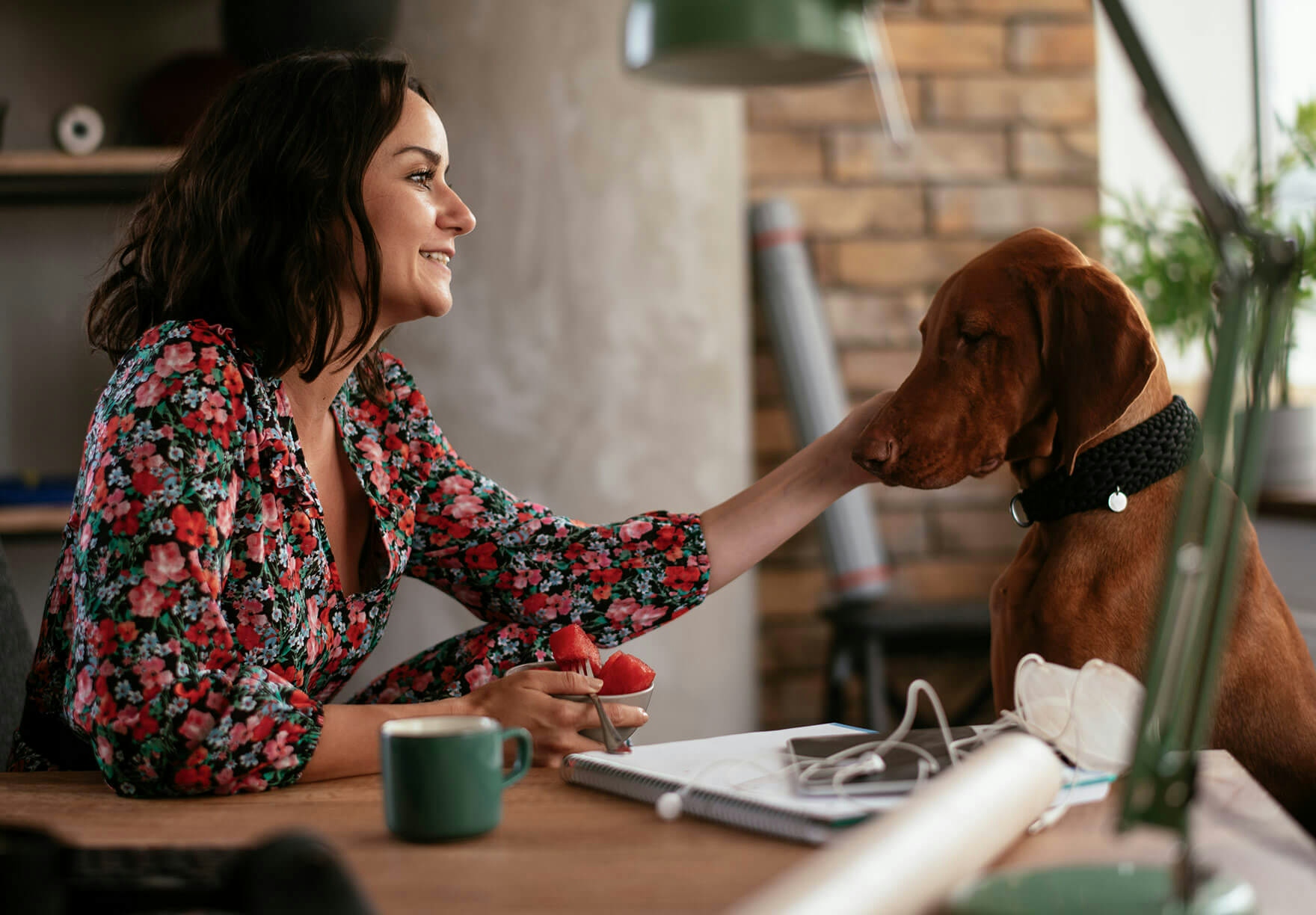Woman with dog in co-working space
